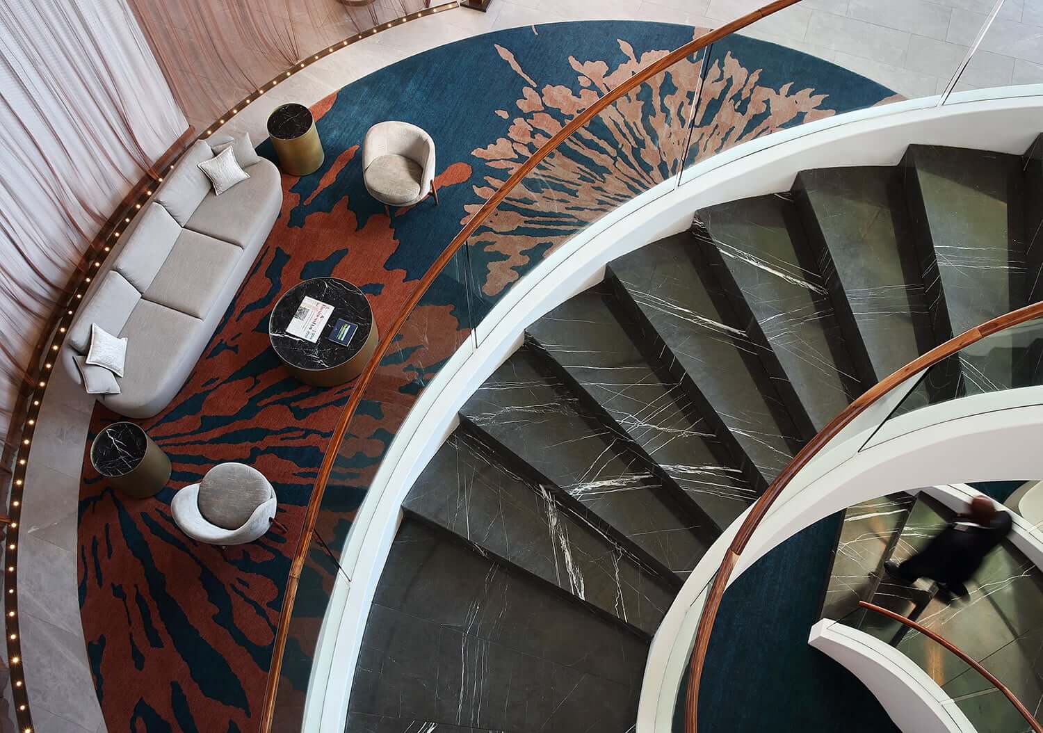 Sweeping spiral staircase in the lobby of the Houghton Hotel and Spa. Photo by Elsa Young. Sweeping spiral staircase in the lobby of the Houghton Hotel and Spa. Photo by Elsa Young.