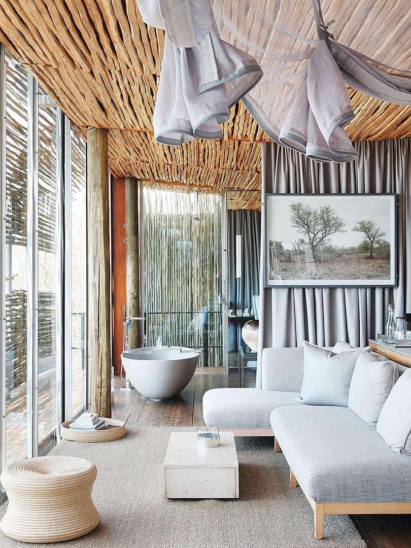Sophisticated suite with in-room bathtub at Singita Lebombo, Kruger National Park.